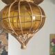 Suspension in wicker and amber glass