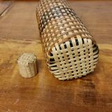 Old bottle dressed in wicker