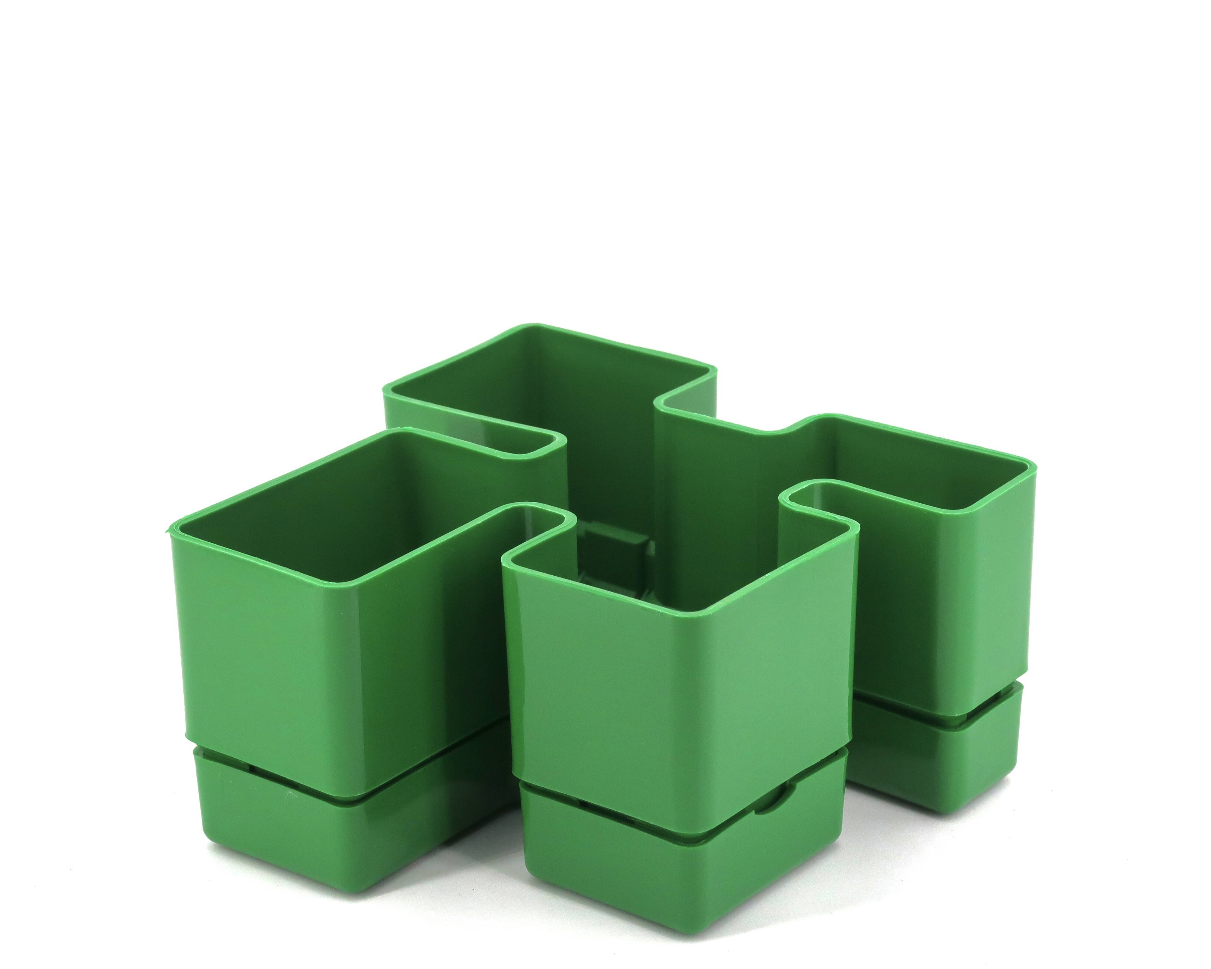 Vastill green plastic planter by Michael McCann