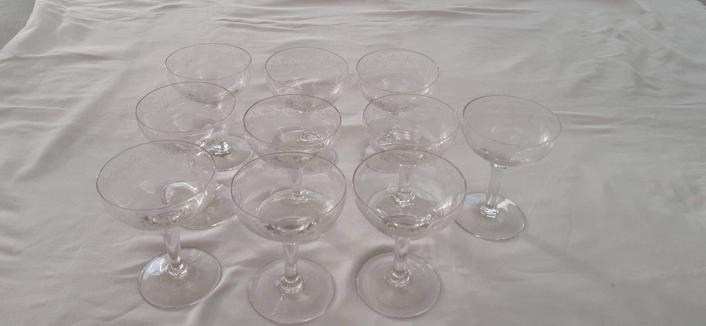 Ten champagne coupes from the Belle Époque.
