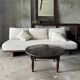 Coffee table, round antique Indonesian teak table with straight legs.