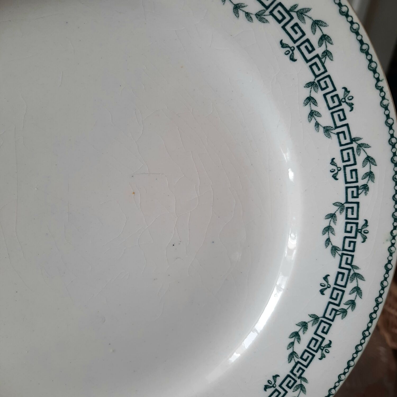 Old dessert plates mismatched in iron earth
