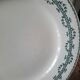 Old dessert plates mismatched in iron earth