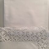Old embroidered white linen and surnappe tablecloth
