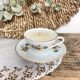 Natural soy wax candle and porcelain cup