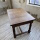 Paneled walnut desk with turned legs, 1900
