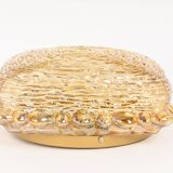 Amber glass wall light in the shape of a fingerprint, Germany, 1970s.