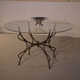 Folding wrought iron table base and indoor/outdoor glass top