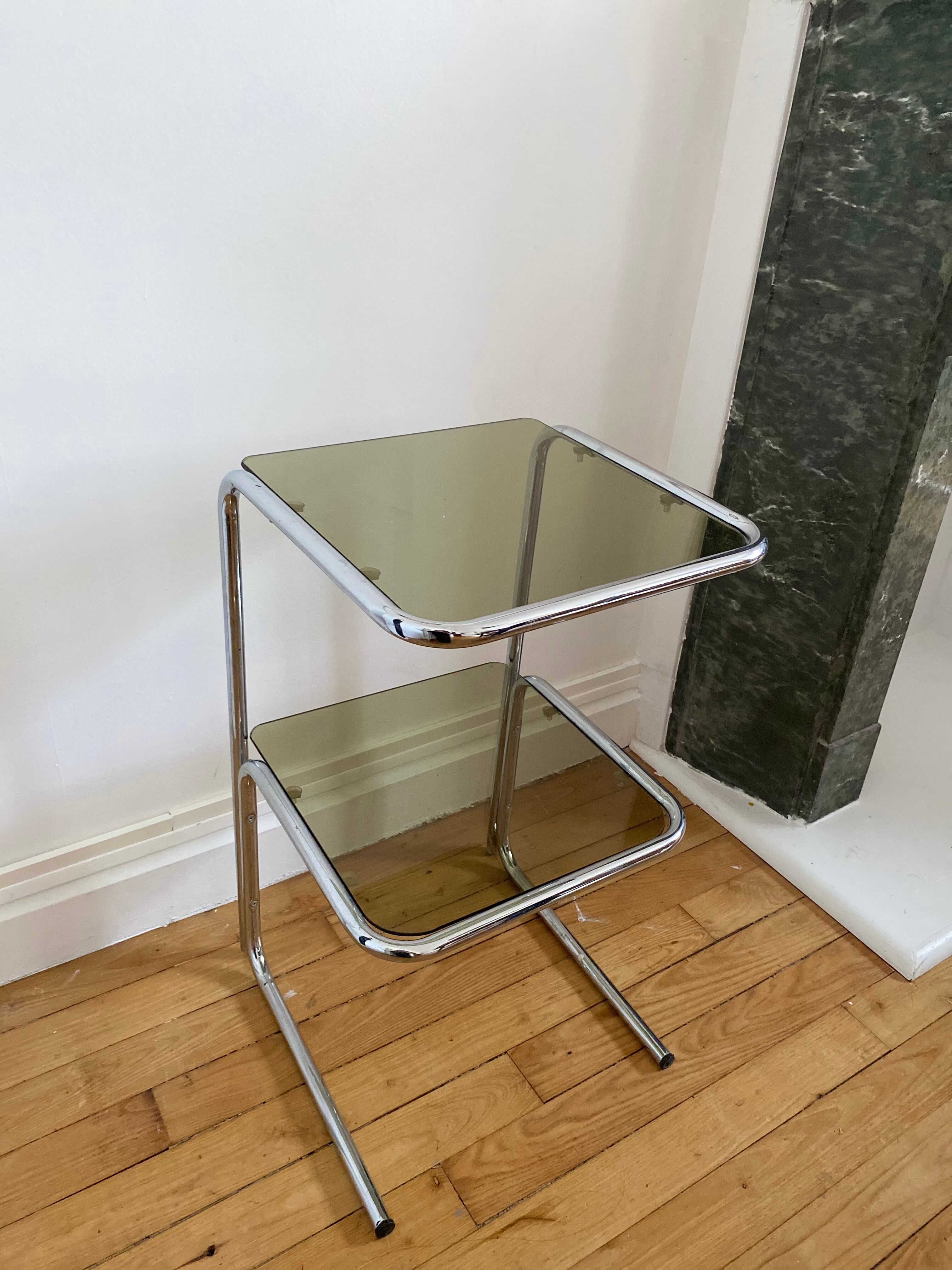 Chrome metal table and smoked glass