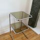 Chrome metal table and smoked glass