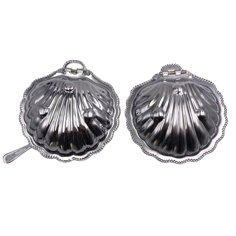 Vintage silver metal shells