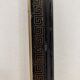 Black and gold frame decorated with Greek frieze decoration