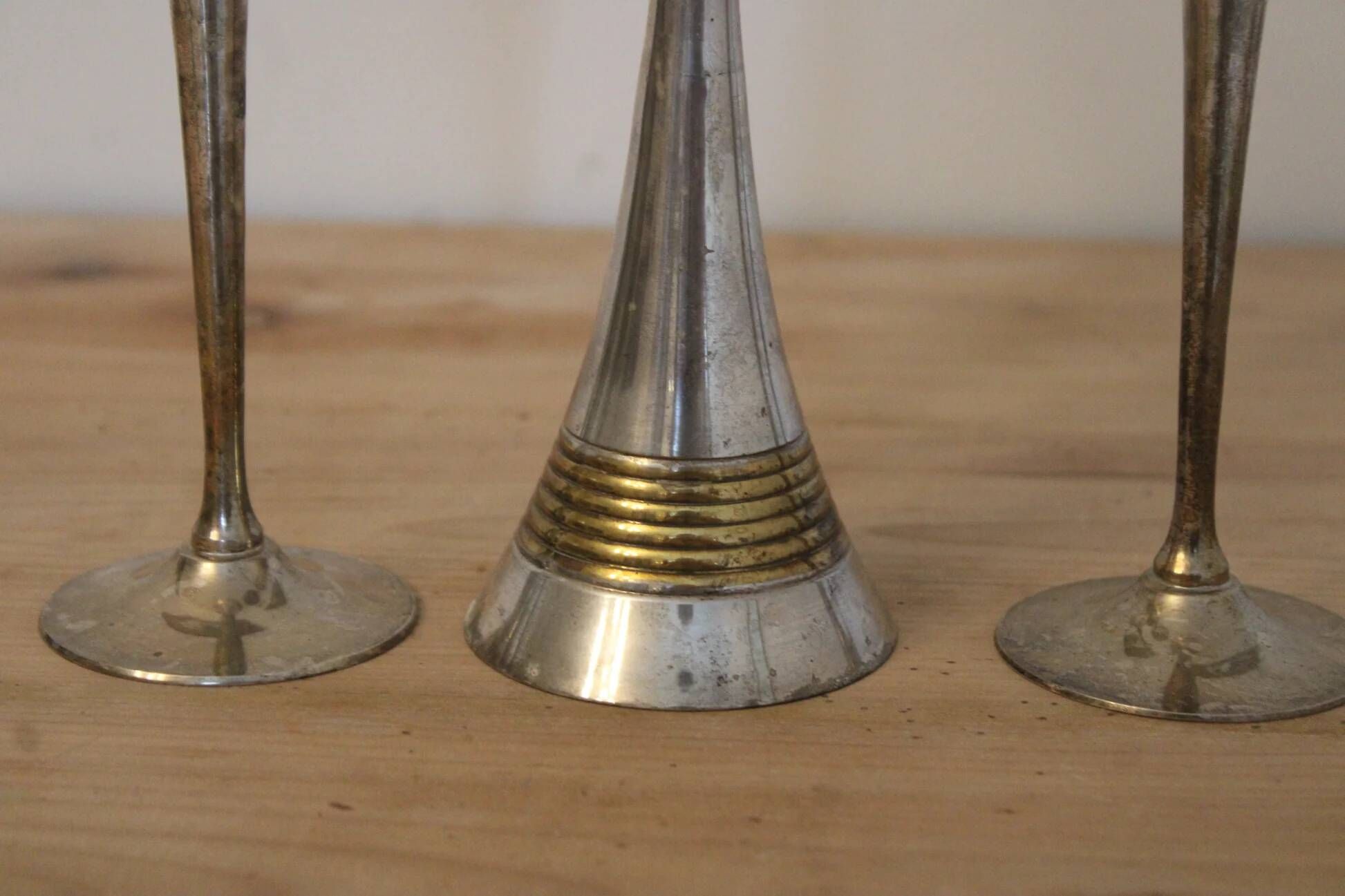Set of 3 vintage silver-plated and gold footed cups.