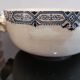 Butterfly ear bowl in iron clay with blue patterns