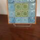 Vintage wooden and ceramic trivet