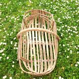 Old wooden harvest basket, slatted wooden basket, folk art.