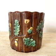 Antique slip pot with acorn decoration