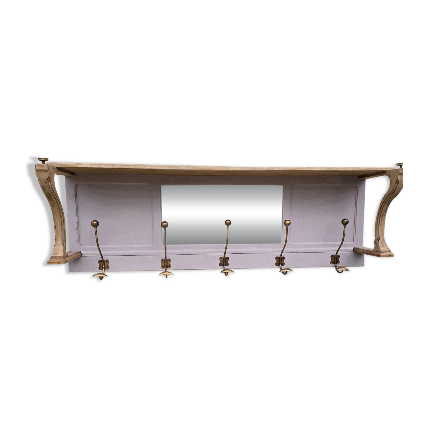 Coat rack or wall-mounted entrance wardrobe with scroll arms and antique hooks.