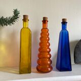 Trio of bottles 1970 color orange yellow and blue geometric shape