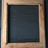 Wooden frame decorated with a frieze.