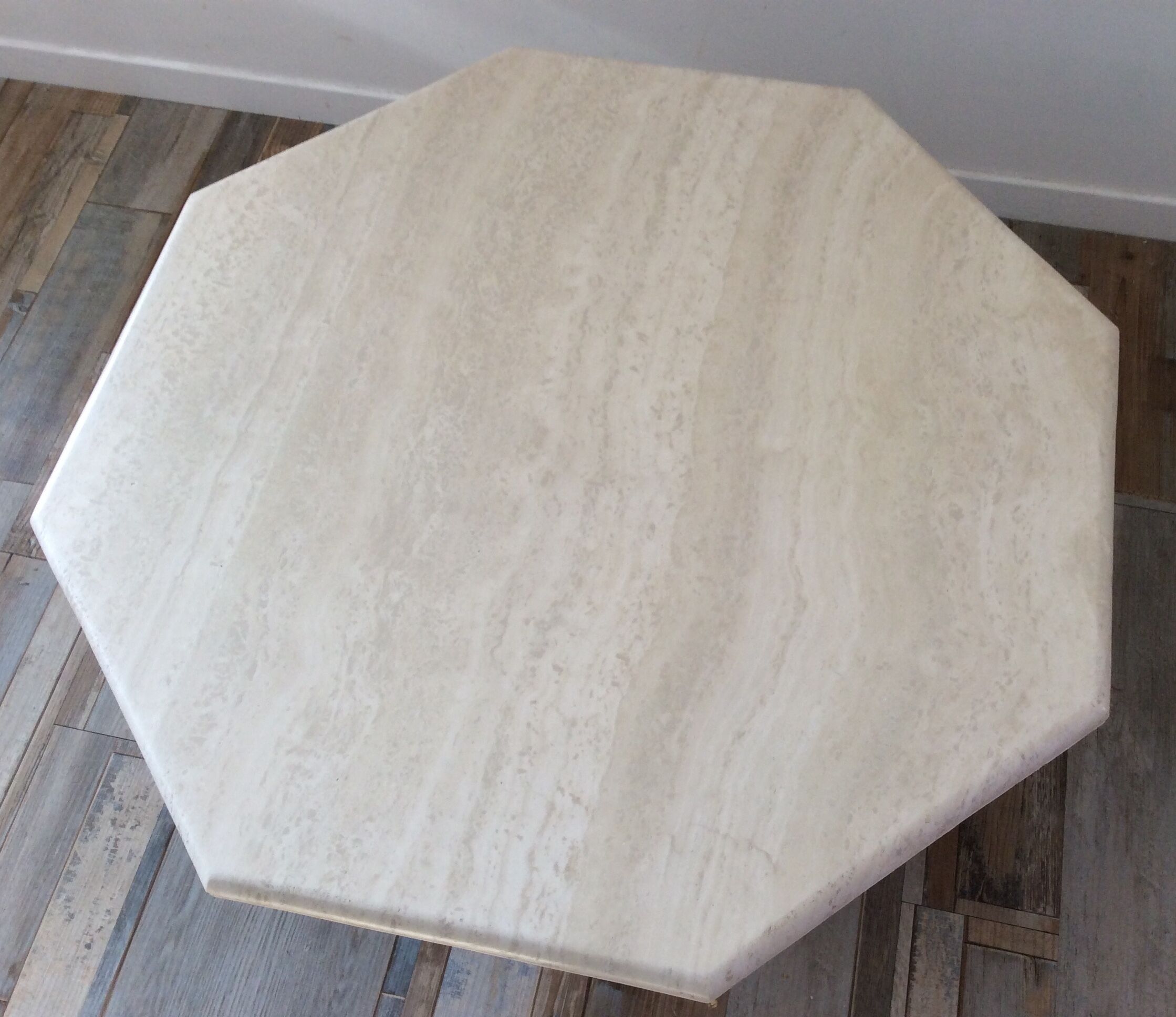 Octagonal coffee table in travertine