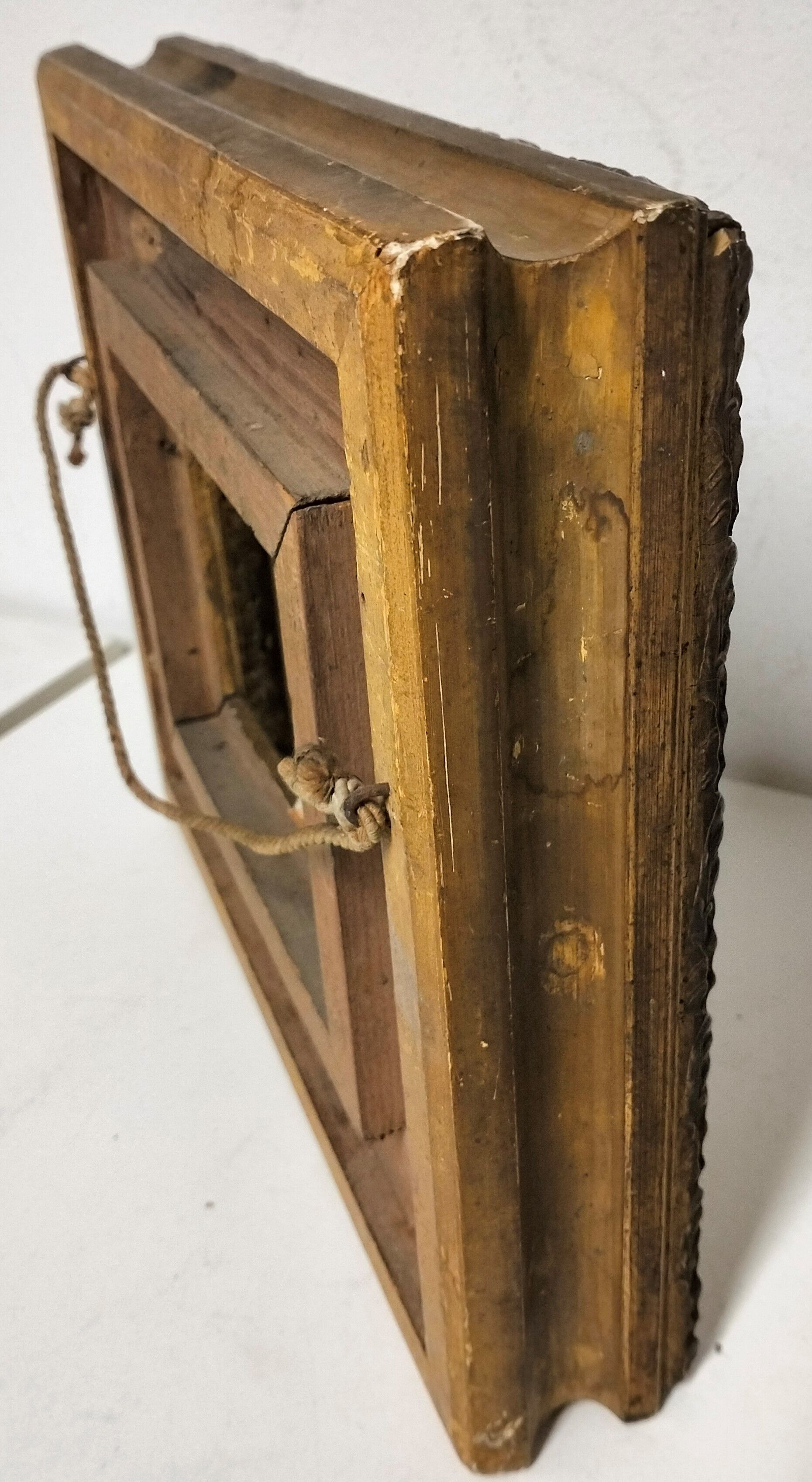 Frame wood and gilded stucco