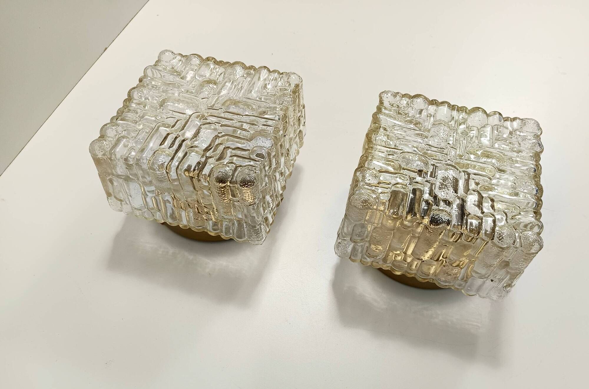 Pair of Square Molded Clear Glass and Gold Varnished Iron Wall Lights
