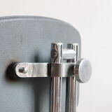Pair of workshop chairs from the 50s in chrome steel and imitation leather