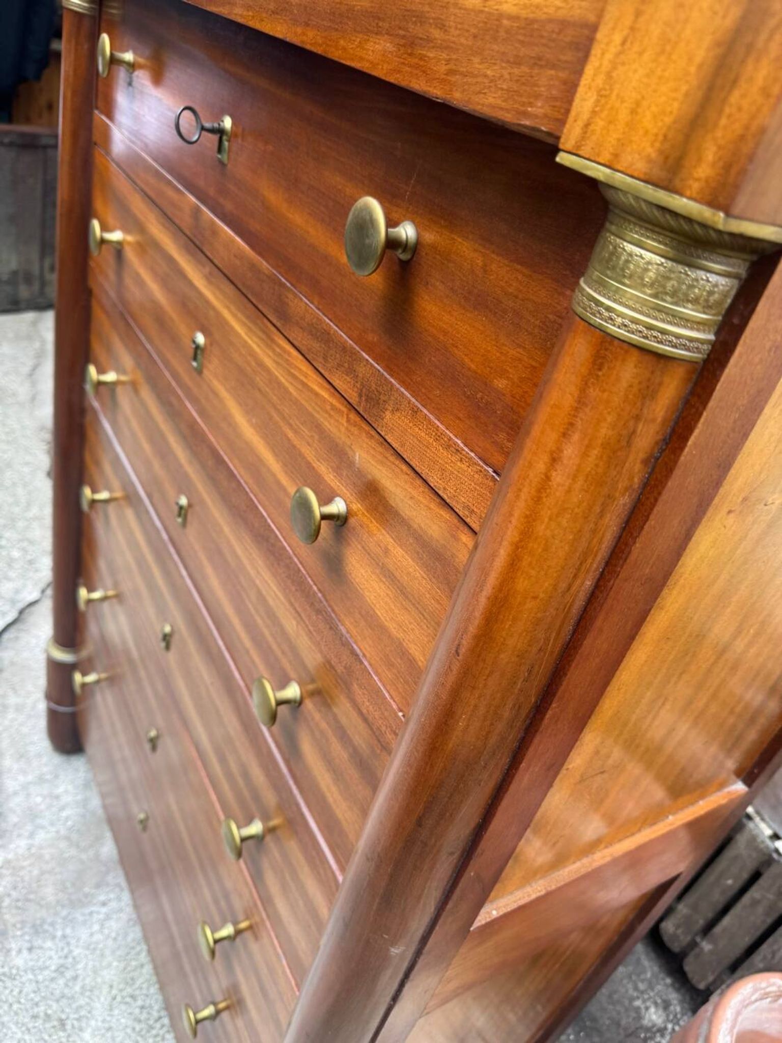Empire chest of drawers in mahogany and black marble, 19th century