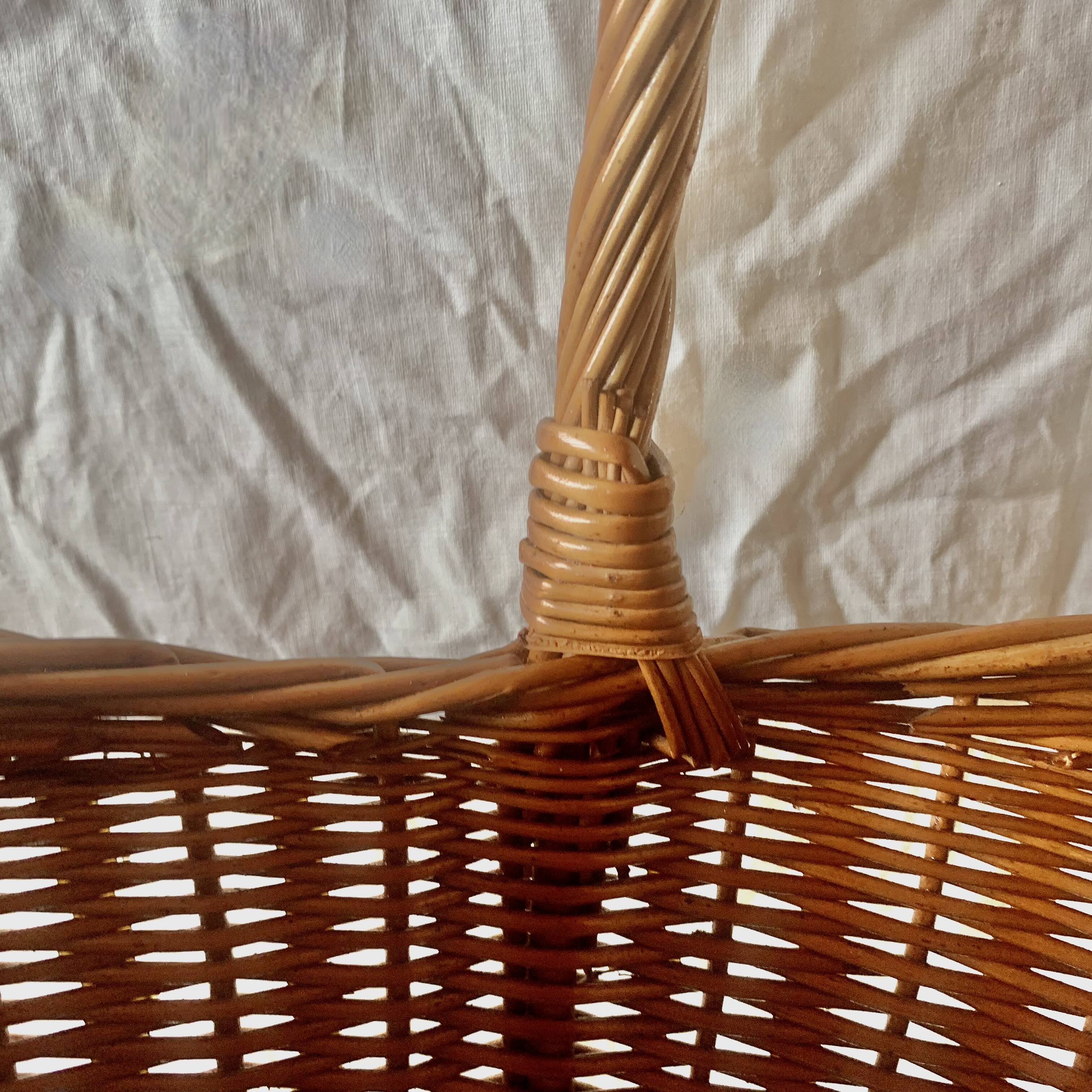 Old woven wicker umbrella stand