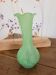 Green vase with high neck made of glass paste