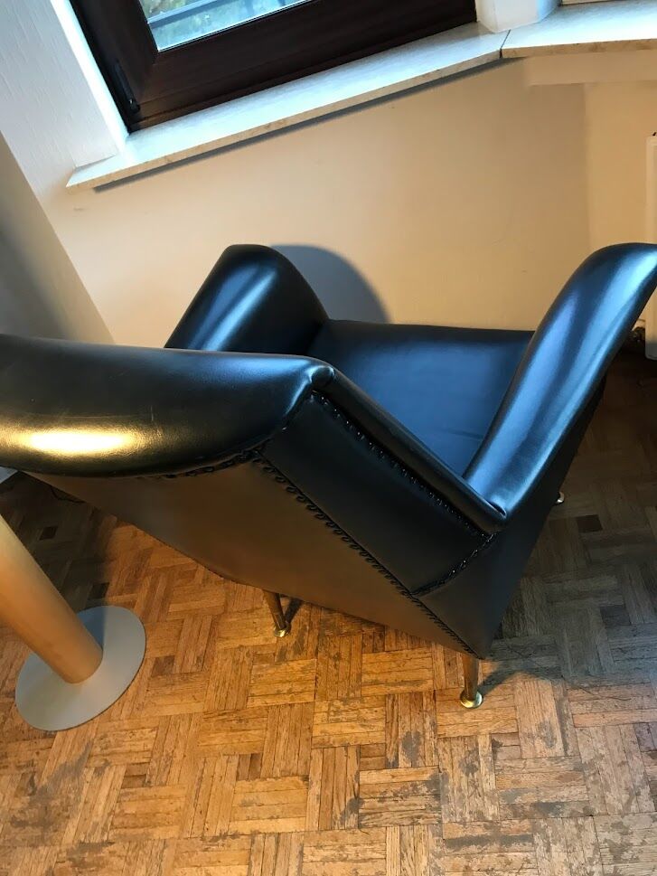 Vintage 60's armchair in black skai.