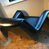 Vintage 60's armchair in black skai.