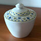 Fine porcelain sugar bowl from Bavaria with a grape design.