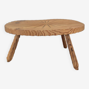Brutalist carved wood tripod coffee table