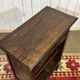 Oak accent furniture bookshelf with a drawer, early 20th century work.