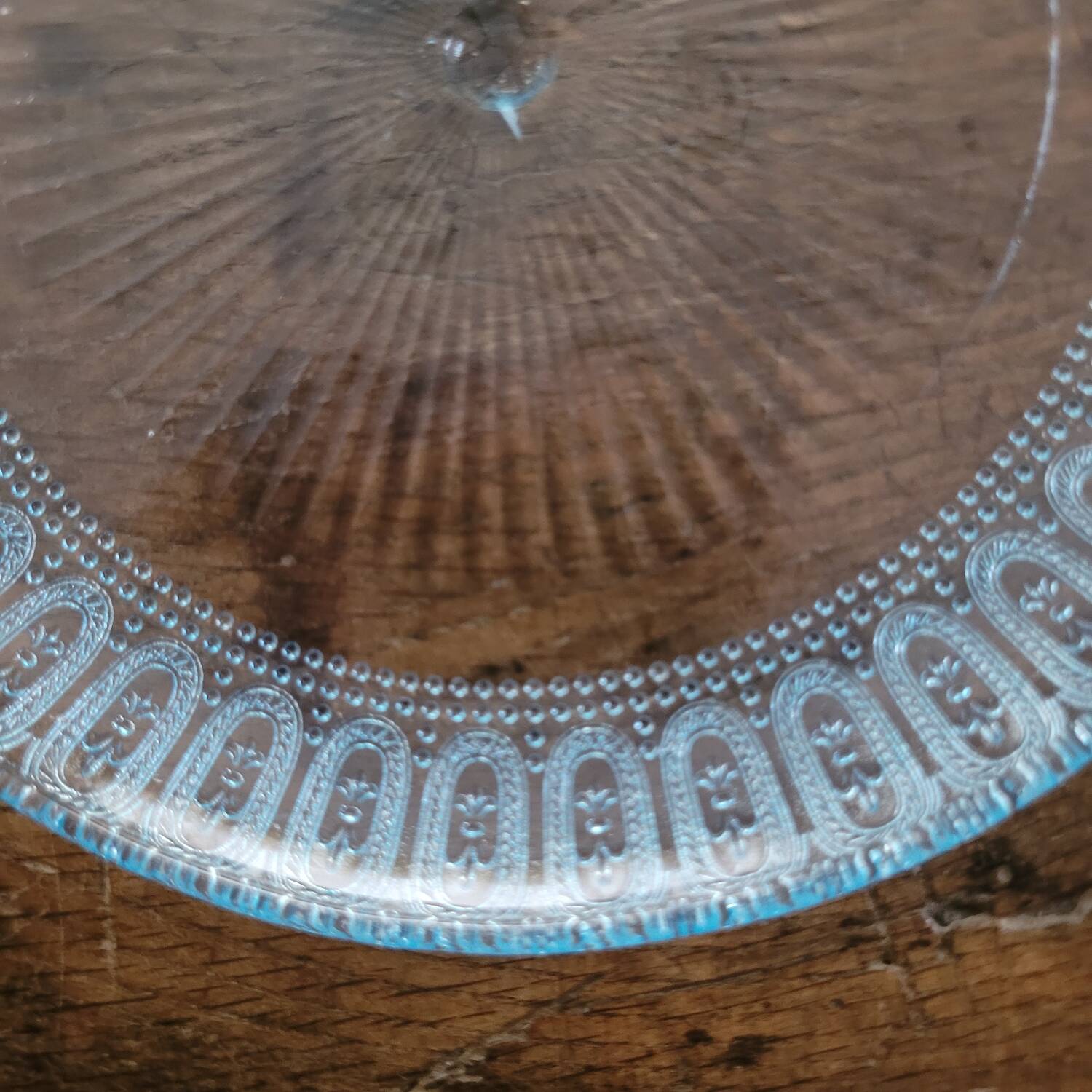 6 molded glass plates – 5 bluish, 1 aqua green