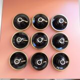 set of 9 black and gold Salins cups and saucers