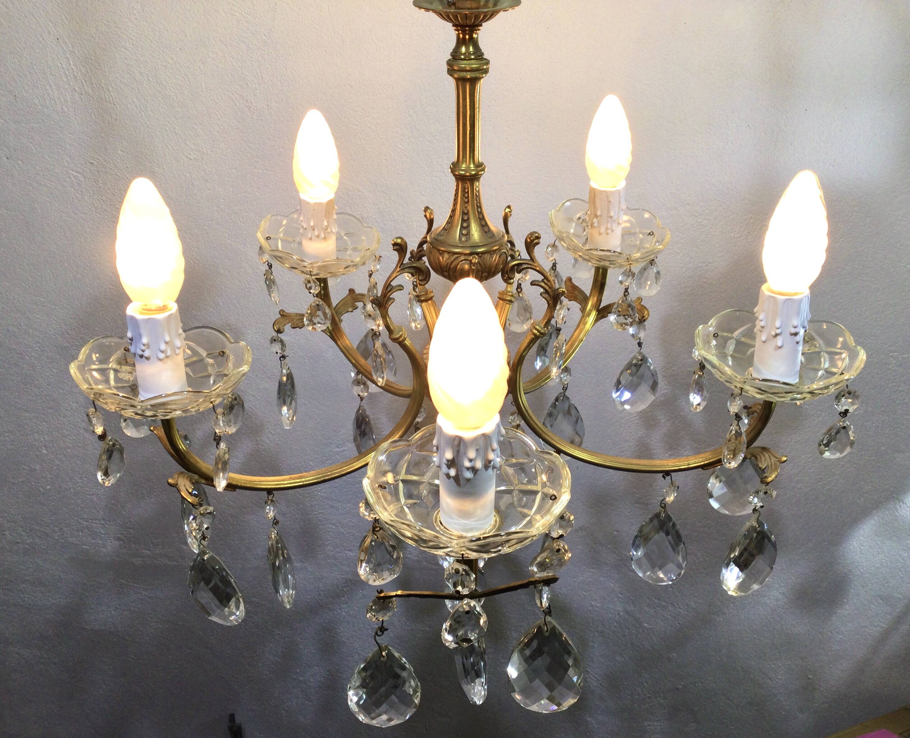 5-light chandelier in brass and tassels