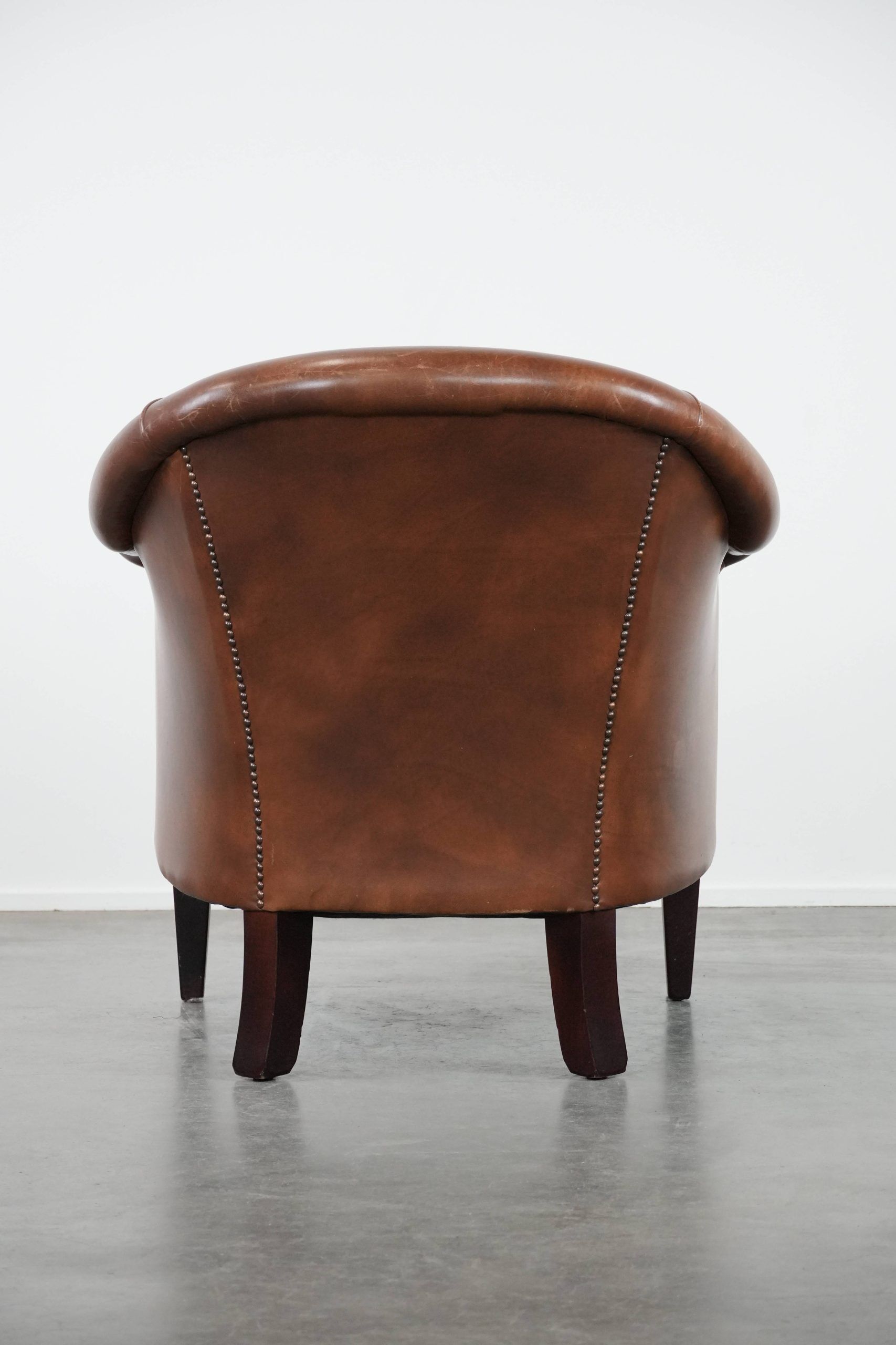 Cognac-coloured vintage cow leather club armchair in English style