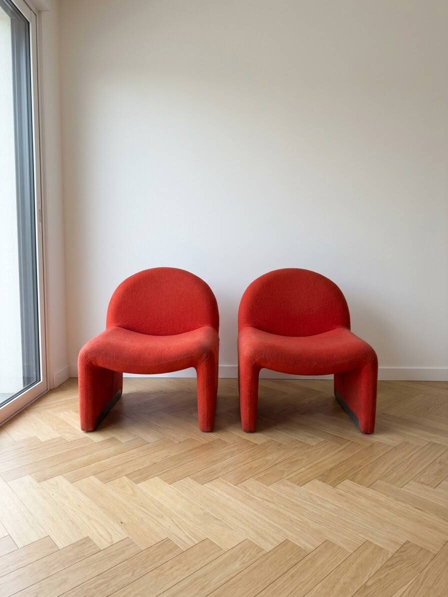 Pair of vintage armchairs from the 70s in red fabric.