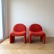 Pair of vintage armchairs from the 70s in red fabric.