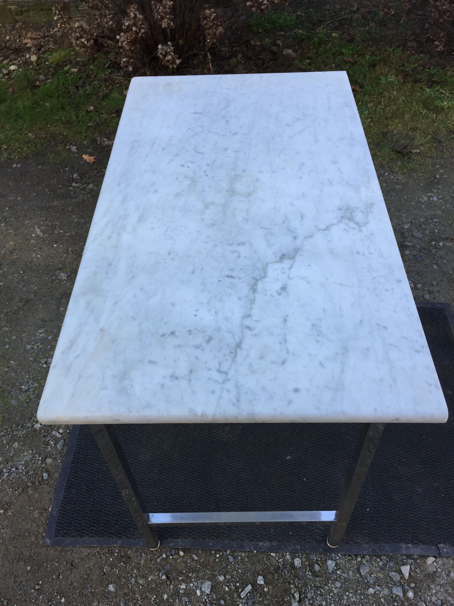Vintage table with square chrome tubular metal base and marble top with 1 drawer.