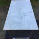 Vintage table with square chrome tubular metal base and marble top with 1 drawer.
