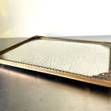 Metal frame in gold colored brass