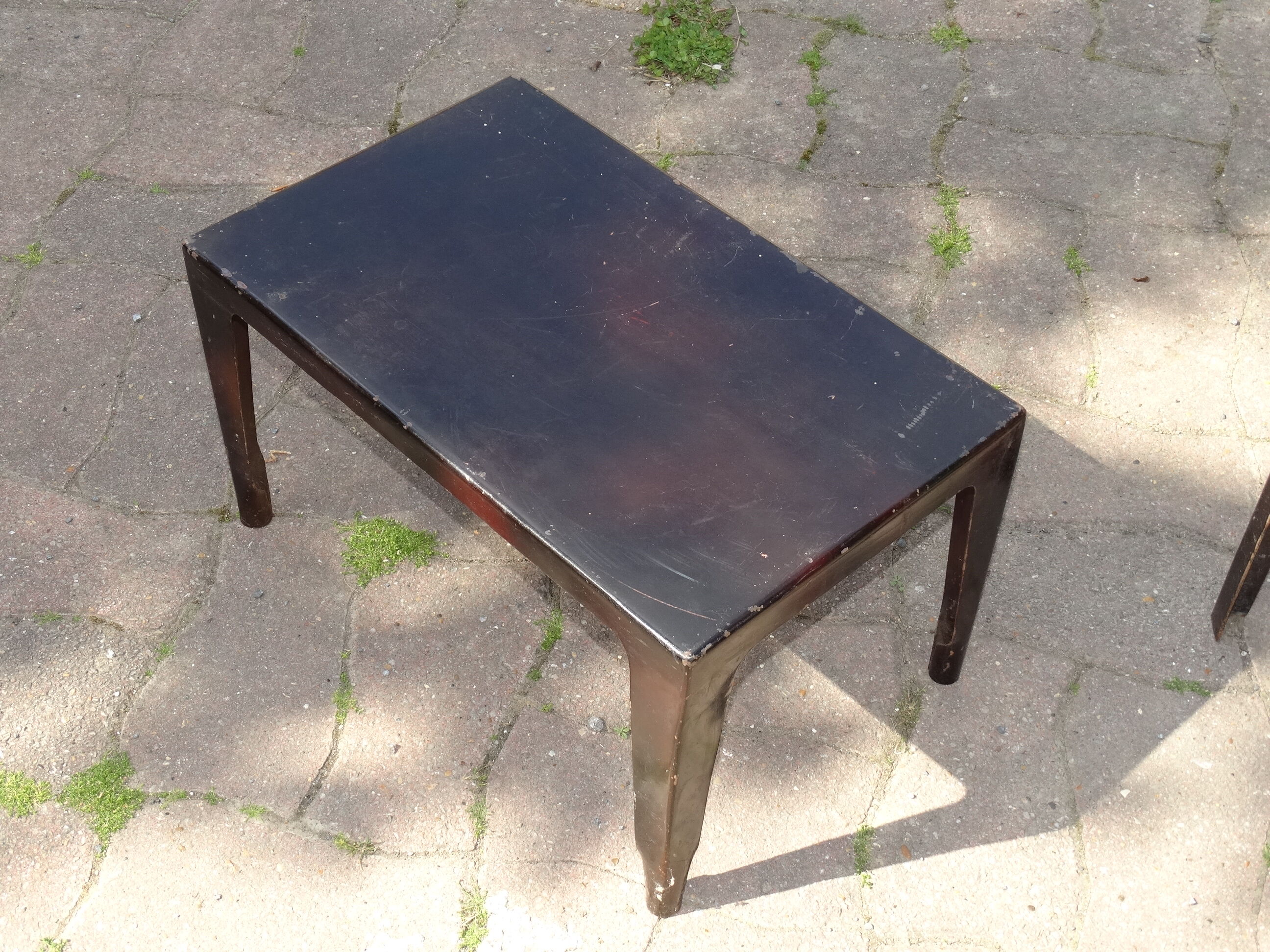 Black one piece plate coffee table