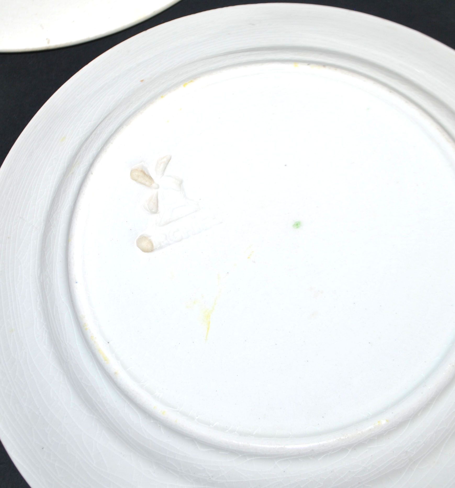 Orchies set of 6 yellow earthenware dessert plates with stencilled fruit decoration.