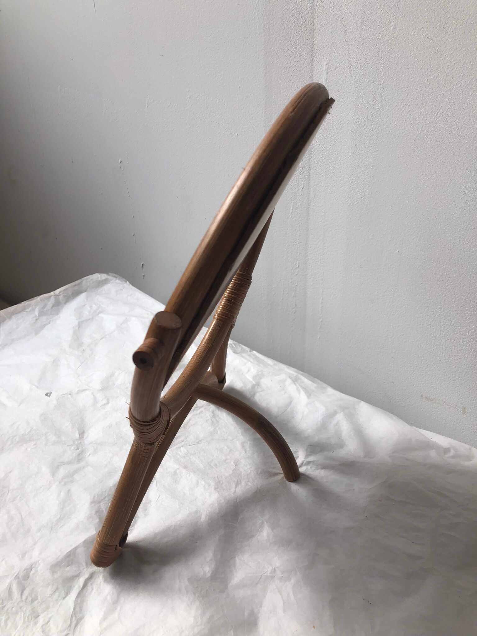 Vintage rattan mirror on stand 27x34cm