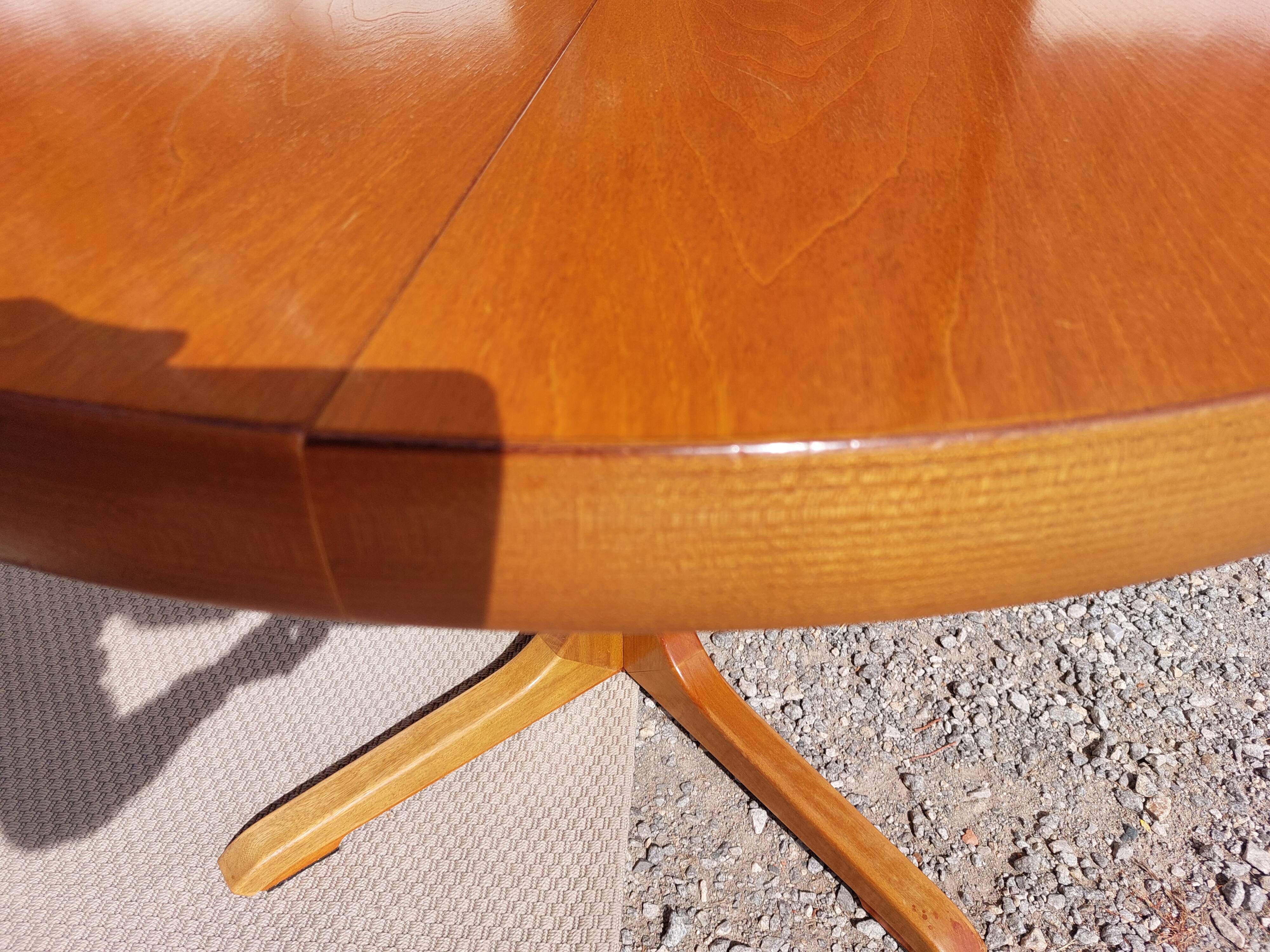 round or oval table with extension, central leg, vintage Baumann design