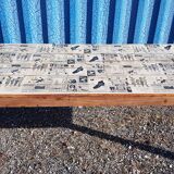 Teak dining table with illustrated top